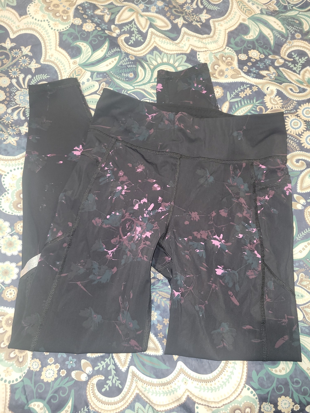Sweaty Betty Black Leggings with Pink and Teal Floral Accents